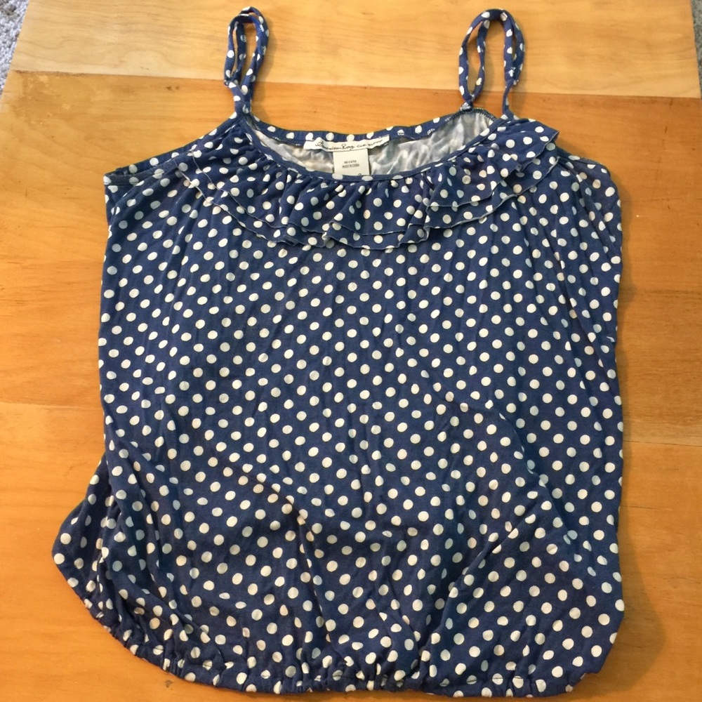 Blue tank top with white polka dots